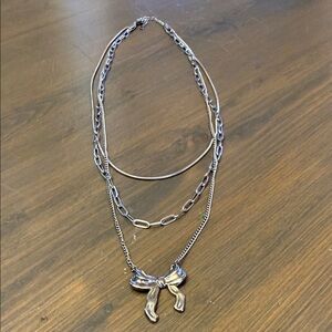 Silver Bow Pendant Necklace